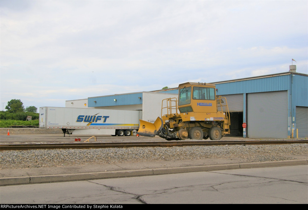 HERCULES TRACKMOBILE SNOWPLOW AT FEED MILL