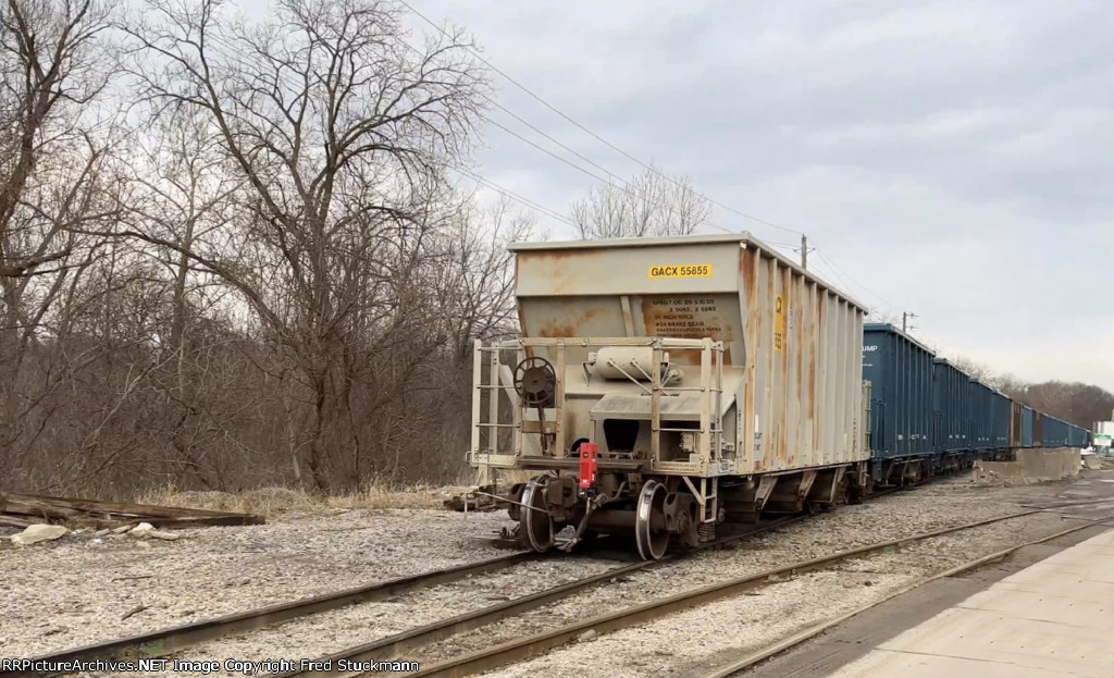 GACX 55855 tags along on its way to Brittain Yard.