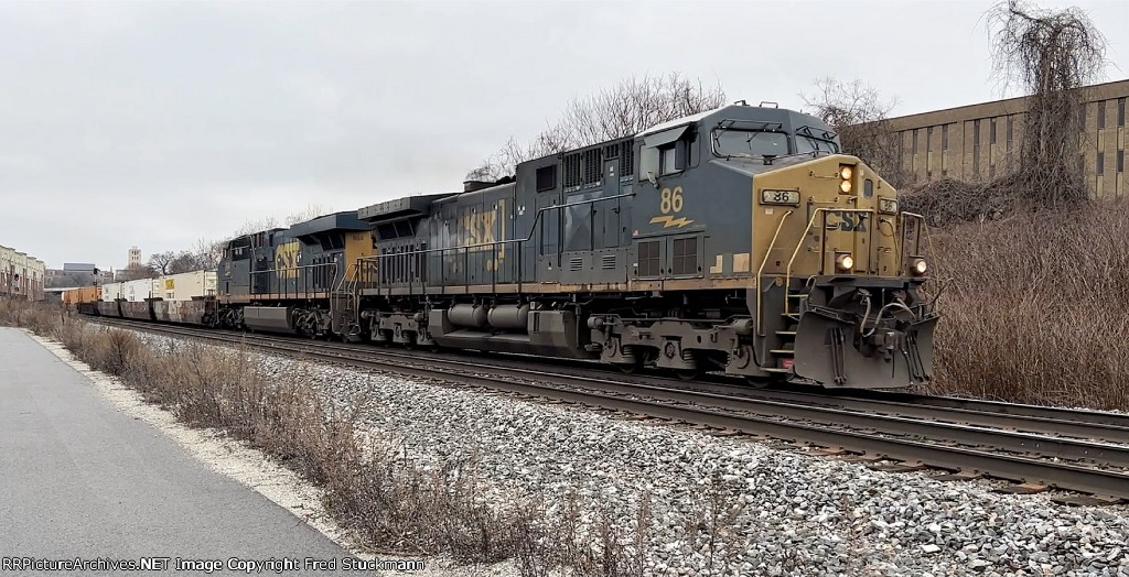 CSX 86 leads I137 west on 2 track.