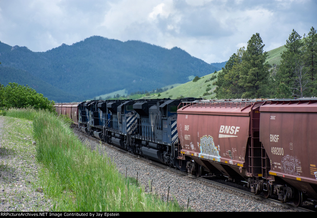 Four ACe's assist a westbund grain train up Mullan Pass