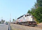 NJT GP40PH-2B # 4213 powers Train # 1610 toward Secaucus Jct and Hoboken after passing the depot