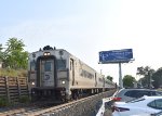 MNR Comet V Cab Car # 6710 is about to pass the station with NJT Train # 1612