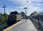 As a NJT Comet Set gets ready to depart Roselle Park Station, an eastbound Conrail Shared Assets freight with mixed CSX power and a foreign goodie passes.