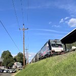 NJT Train # 5733 arriving into Roselle Park Sta with a dual mode pulling four Multilevels