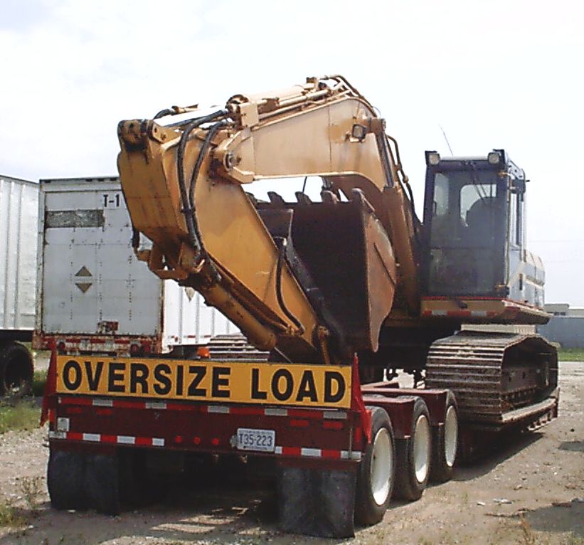 R J Corman CAT Excatvator 