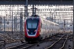 A "Twindexx" EMU threads its way out of Zurich in the late afternoon