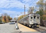 NJT Train # 724 departing Basking Ridge Station with Arrow III Cab Car # 1329 on the point.