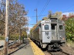 NJT Train # 721 heads away from the Basking Ridge Station toward Gladstone. Arrow III Cab Car # 1377 trails