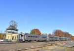 NJT Train # 72 is about to pass the restored Waldwick Erie Tower on the left just before bypassing the depot. An MNR Comet V Set is covering the run with MNR GP40PH-2 # 4906 on the rear