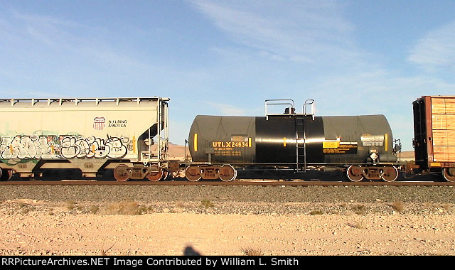 EB Manifest Frt at Erie NV Passing Siding W-Pshr -87