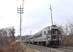 The Santa Train crosses the Rockaway River just before passing the Boonton commuter rail station heading back to Wayne-Rt. 23 Station 