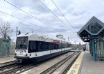A northbound HBLRT Train arrives at the 22nd Street Station