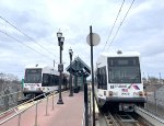 Two light rail vehicles at 8th Street Station