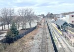 This view is looking south from the 34th Street Station pedestrian bridge over the HBLRT Line plus Conrails Shared Assets Bayonne Branch(former Central RR of NJ Line)