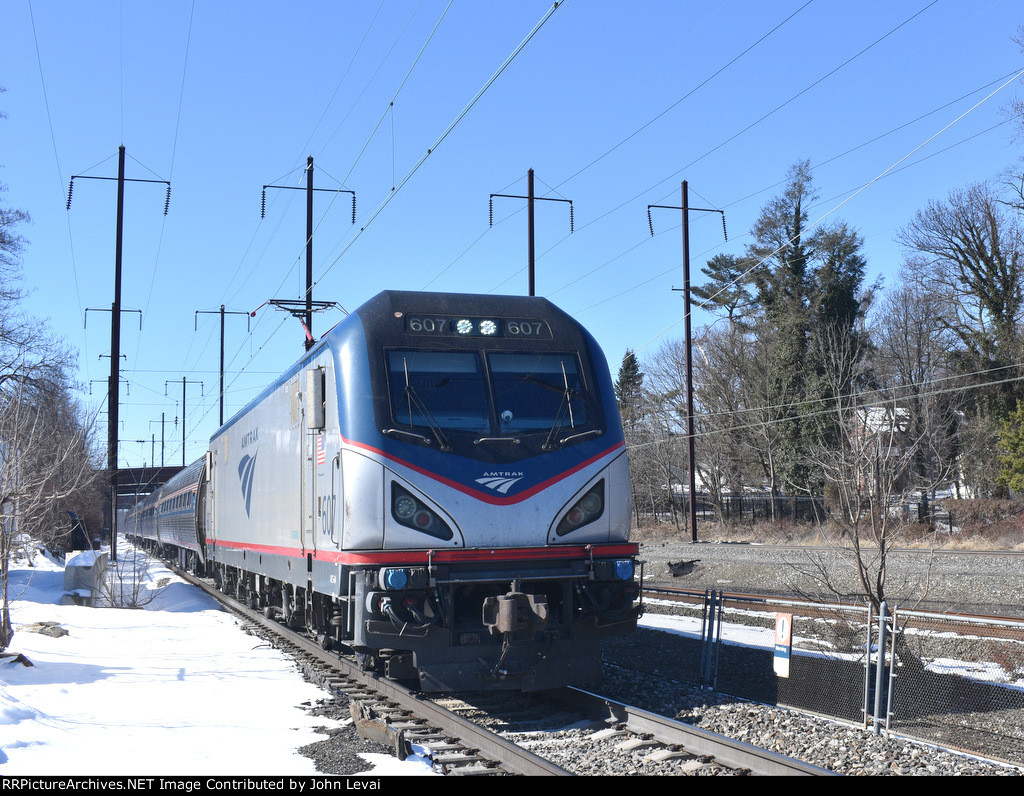  Sprinter # 607 pulls Amtrak Keystone Train # 666 into Parkesburg. The train is heading from Harrisburg to New York City.