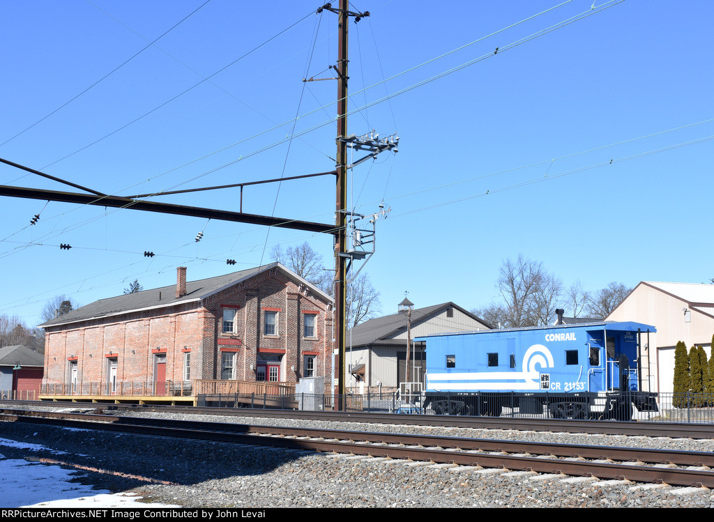 Ex-PRR Freight Station on the left and a restored Conrail Caboose on the right