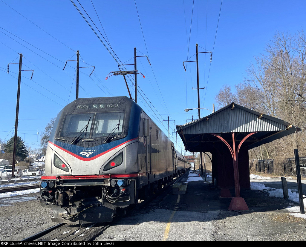 Amtrak ACS-64 # 623 shoving Train # 661 out of PAR