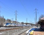 Amtrak Train # 43 heading west to Pittsburgh behind P42DC # 125 as it passes the Parkesburg Station. In the background is the Parkesburg Tower.