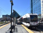 Car # 5022B trailing at a westbound HBLRT Train to West Side Avenue Station as it departs Jersey Ave Sta