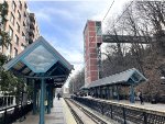 This view is looking south at 9th Street Station in Hoboken. On the right is a long elevator that connects passengers from Paterson Plank Road to the station.