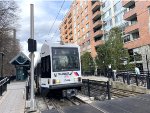 A West Side Avenue bound light rail train pauses at 9th Street Station in Hoboken