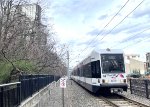A West Side Ave bount LRV train glides into the 9th Street Station 