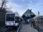 A West Side Avenue bound HBLRT train pauses at Port Imperial Station 