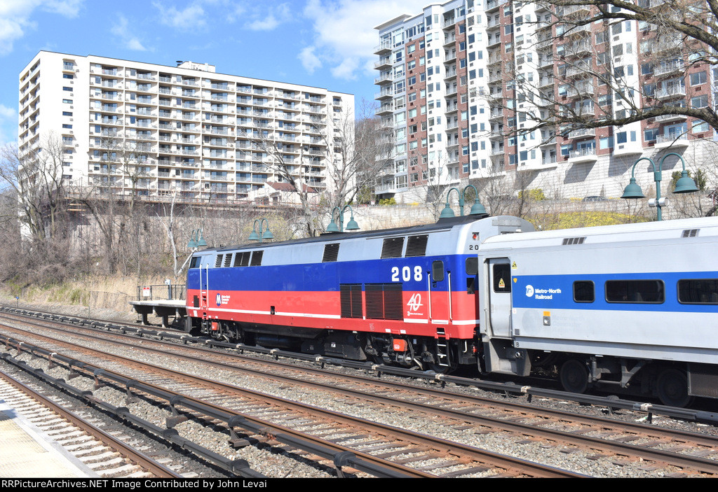Side rear view of MNR P32AC-DM # 208 