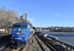 Northbound Poughkeepsie bound train with MNR P32AC-DM # 207 doing the honors, bypasses the depot