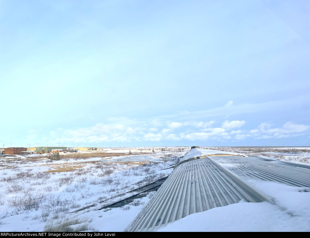 Departing Churchill on schedule-the business district of Churchill is on the left 