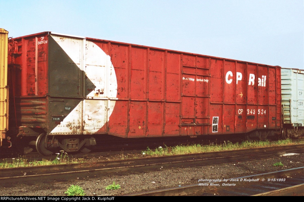 CP 343534, Woodchip car, White River, Ontario. September 15, 1993