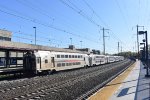 Eastbound NJT Multilevel Set with the cab control car leading departing the station 