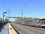 NJT Multilevel Cab Car # 7047 trailing on the rear of NJT Train # 3736