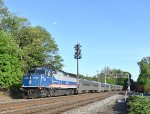 NJT Train # 1269, enroute from Hoboken Terminal to Waldwick, crosses the Hollywood Avenue grade crossing behind a MNR F40PH-3C locomotive