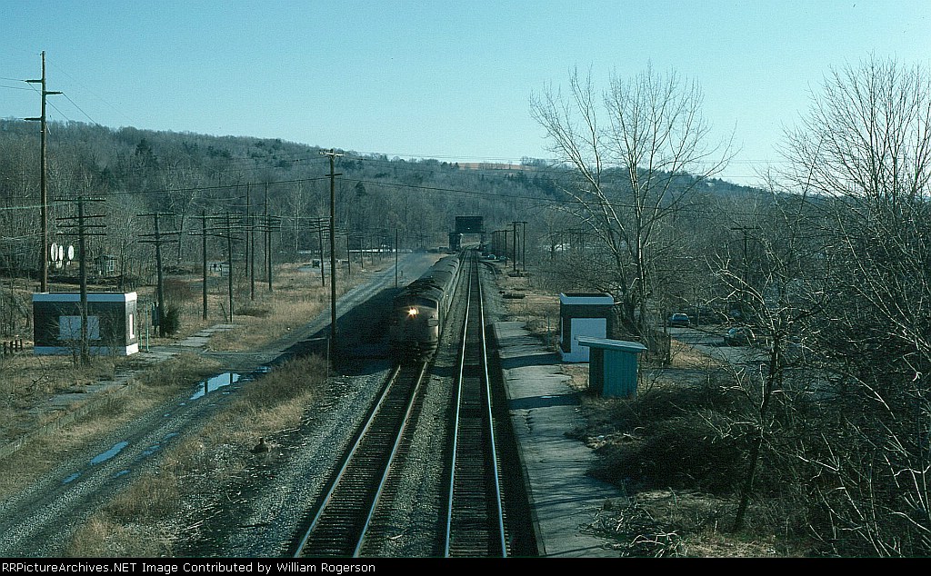Northbound Metropolitan Transit Authority (New York) Commuter Train powered by a pair of Conrail (CR) EMD FL9's