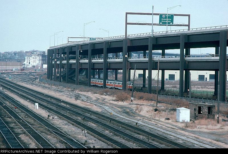 Massachusetts Bay Transportation Authority Orange Line Transit Cars approaching the Station 