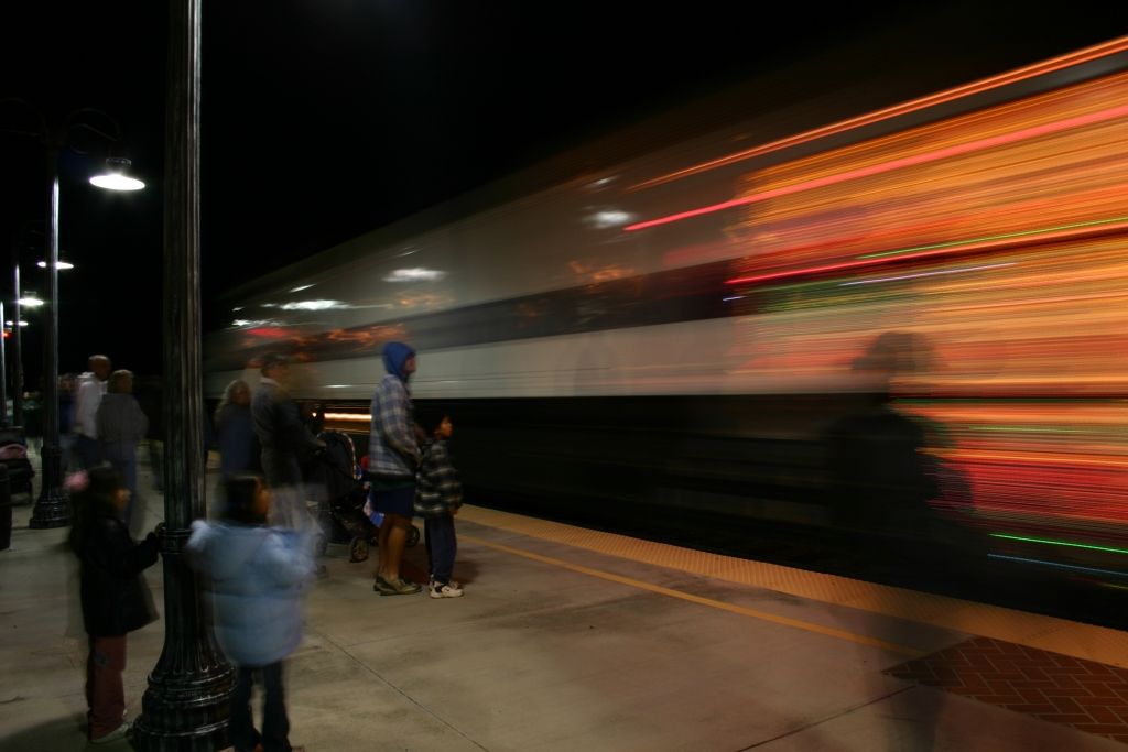 A crowd of onlookers await the show from Metrolink