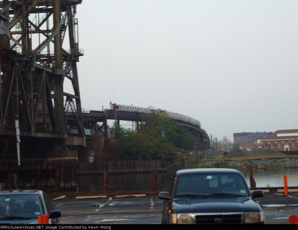 Eastbound PATH train off the Dock Bridge