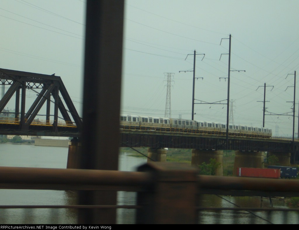 Newark-bound PATH train comes off Hack bridge