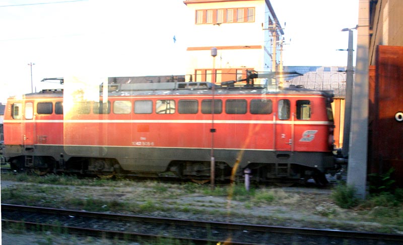 Austrian Locomotive Seen Though Passenger Car Window