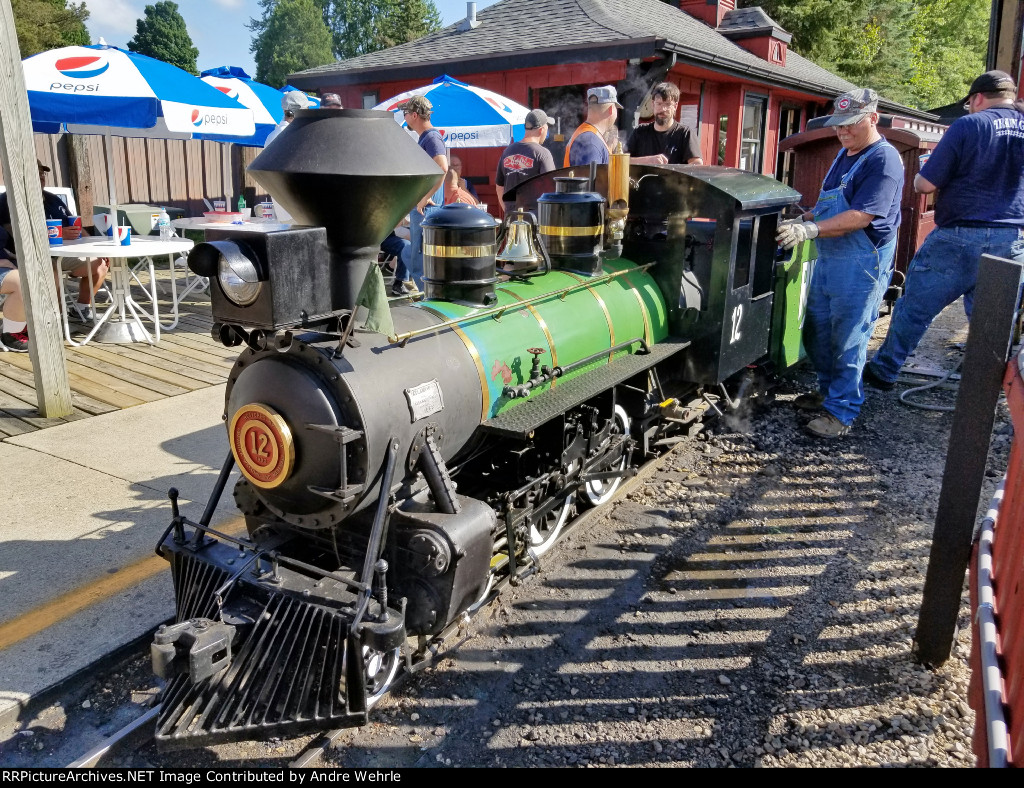 Whiskey River Railway's Atlantic "Gracy" gets a quick once-over between runs