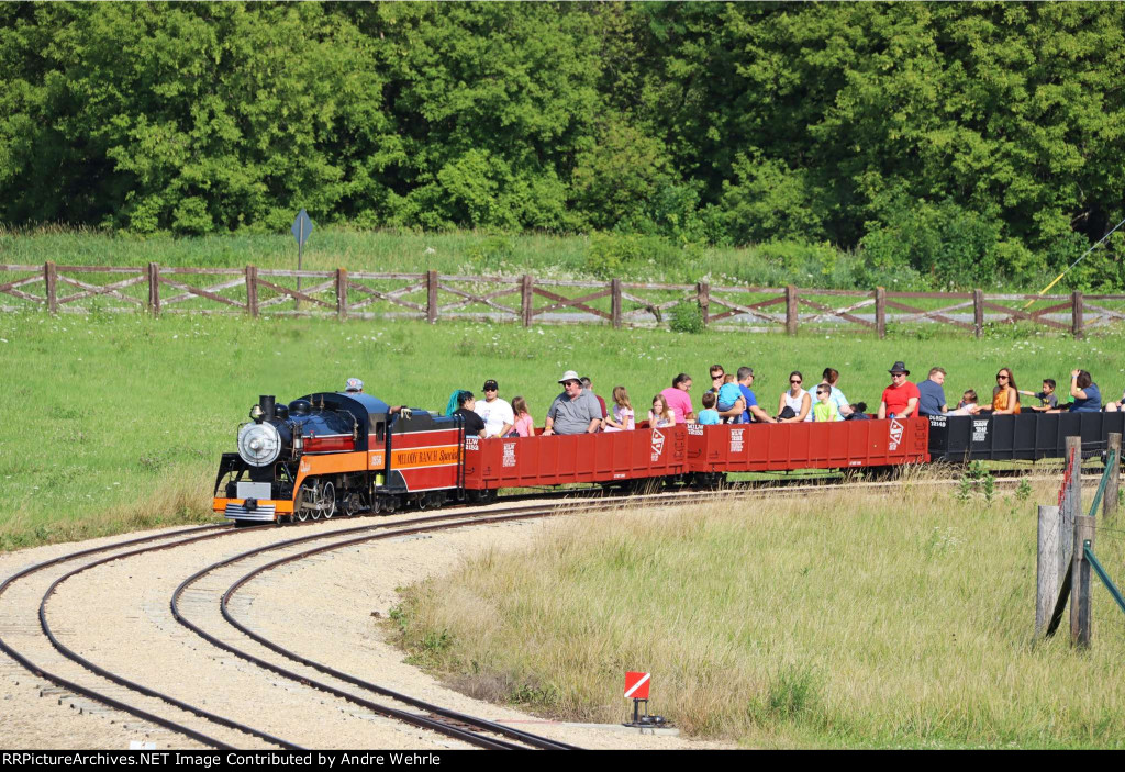 Now "Melody Ranch Special" rounds the bend on the back stretch