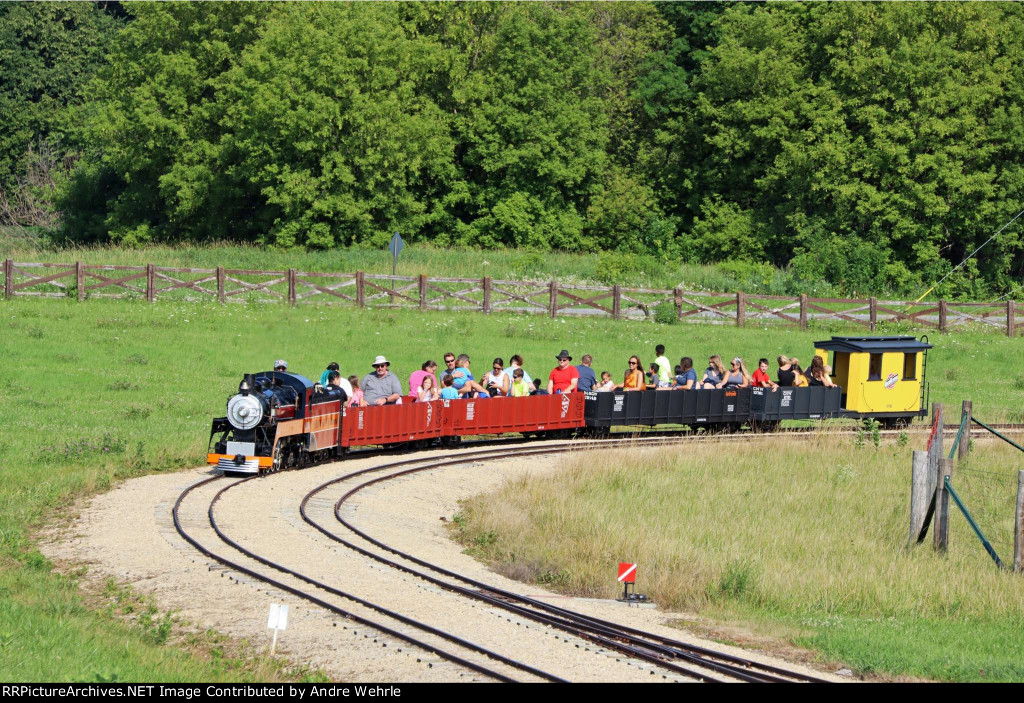 "Melody Ranch Special" and train rounding the curve