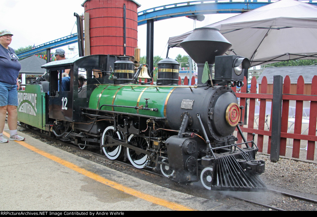 Whiskey River Railway's coal-fired Atlantic "Gracy" prepares to take on water