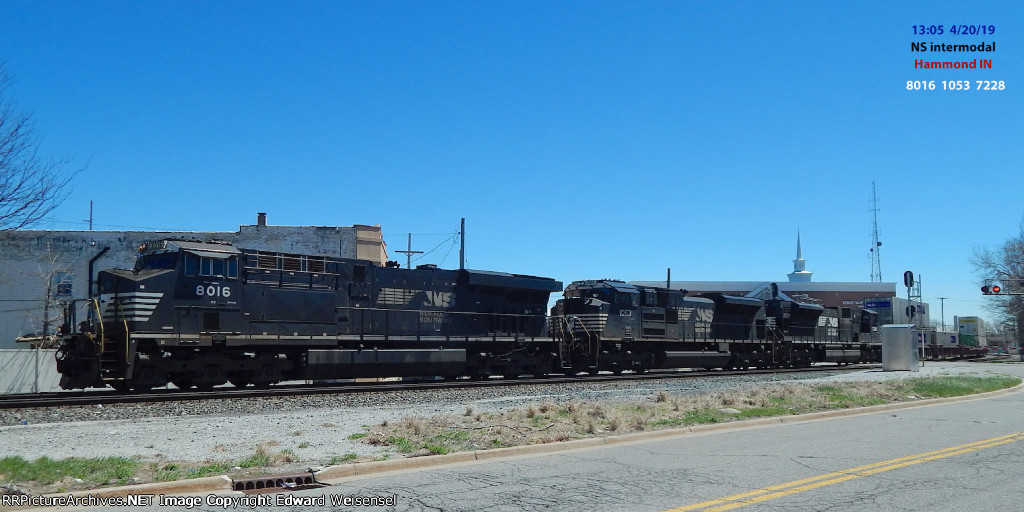 Westbound intermodal includes a former CSX SD80Mac