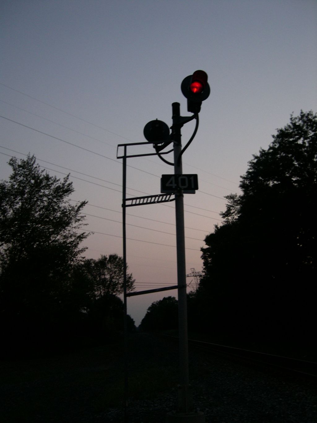 Norfolk Southern Signal 401 Is Lit Up Red Because A Northbound Train Has Just Passed