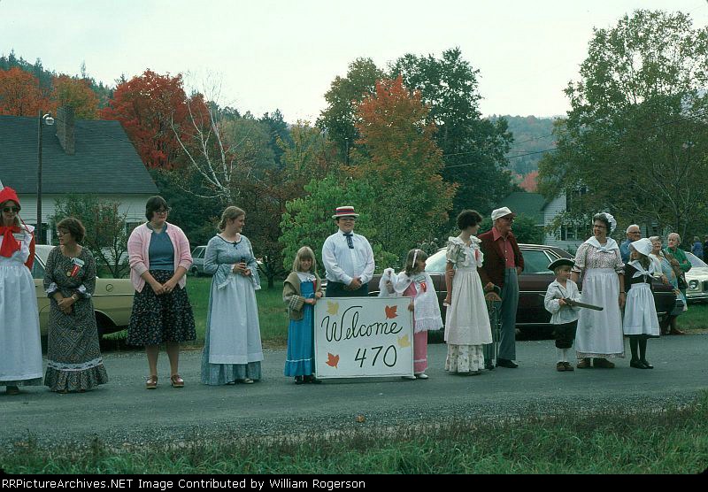 Local Residents gather to greet the 470 Railroad Club Railfan Extra