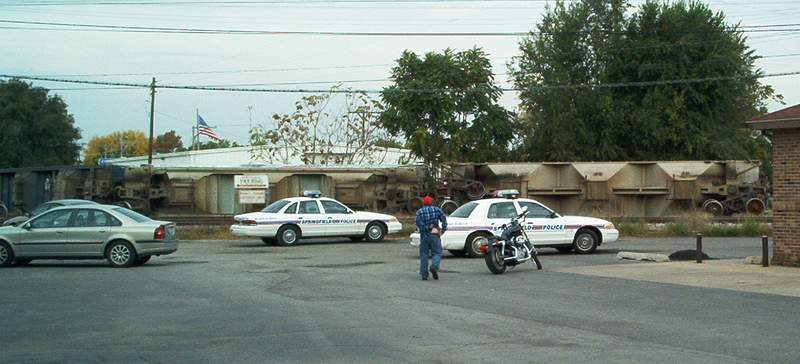 Grain cars laying on the ground