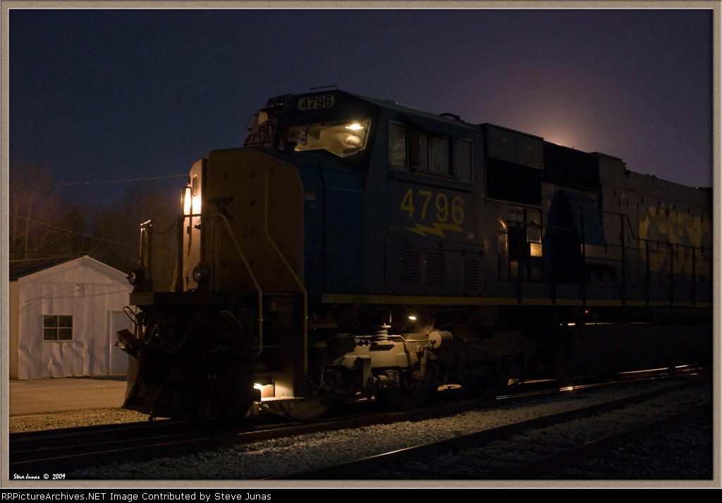 CSX 4796 of Q526 waits in the yard with the engineers ghost in the cab