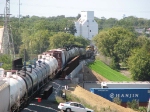 070911027 A long westbound CP freight crosses the new CP/SHO bridge over BNSF Northtown
